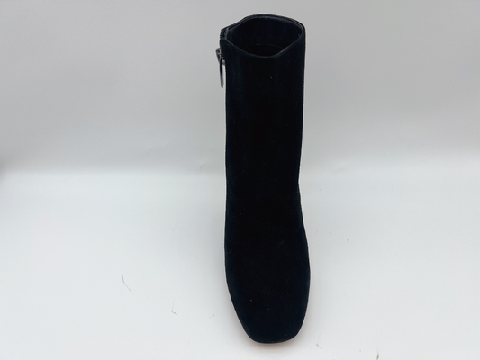 Bottines noires du talon haut des femmes en cuir avec la tirette en nylon