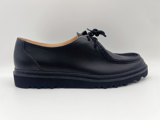 L'appartement noir fait sur commande chausse les chaussures de travail imperméables du glissement des femmes non