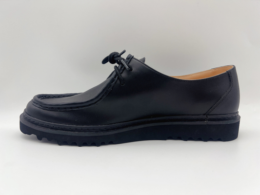 L'appartement noir fait sur commande chausse les chaussures de travail imperméables du glissement des femmes non