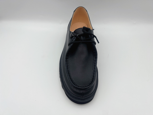 L'appartement noir fait sur commande chausse les chaussures de travail imperméables du glissement des femmes non