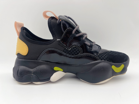 Les hautes chaussures de basket-ball supérieures de dames noires glissent l'ODM/OEM résistants