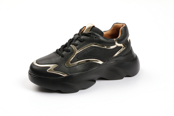 Les sports sportifs de dames chausse les chaussures faites sur commande de glissement de noir de plate-forme non