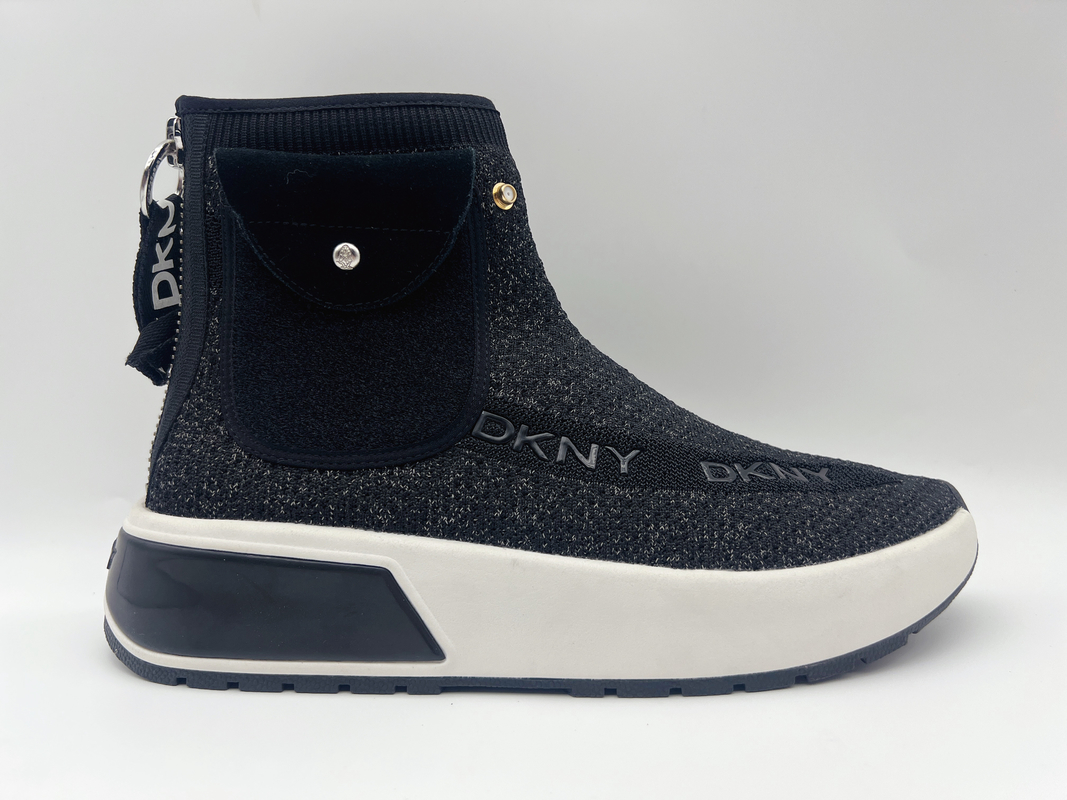 Les chaussures de travail résistantes de glissement supérieur élevé noir de dames tricotent doucement le tissu avec plié